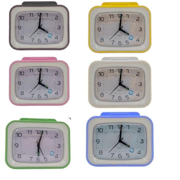 Réveil de Nuit analogique avec Porte téléphone crayons Réveil de Table Horloge(Couleur aléatoire)