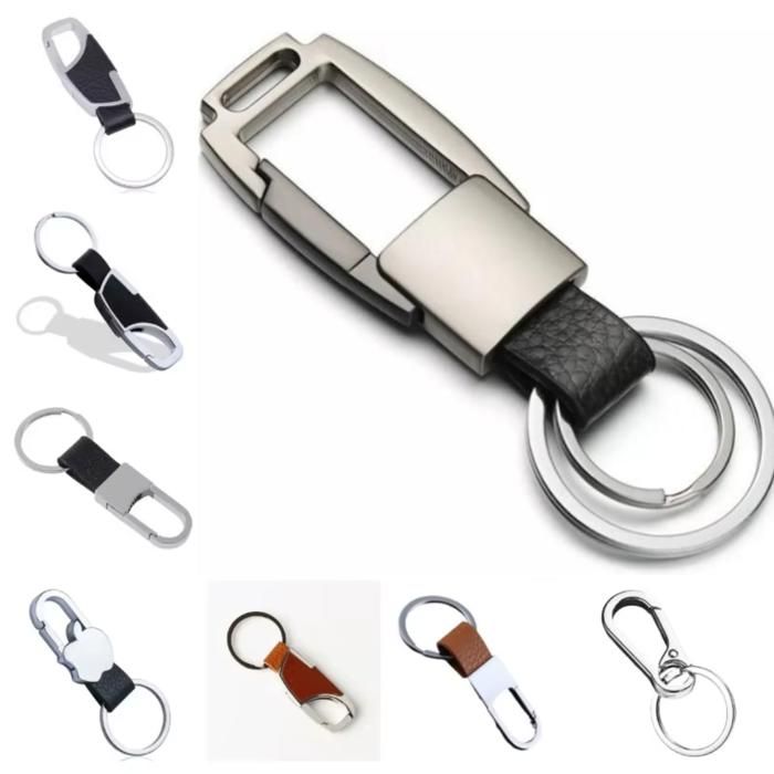 Porte-clés moderne avec attache en métal et lanière en cuir(Couleur aléatoire)