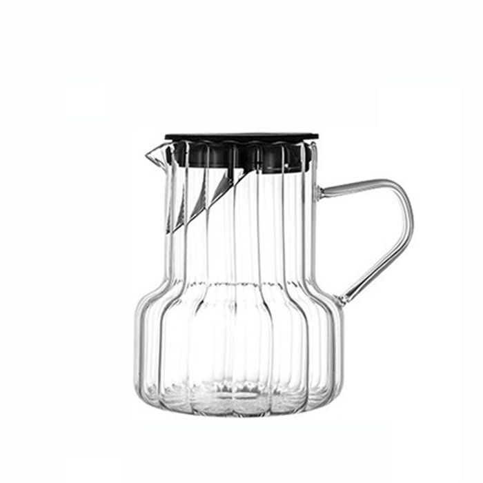 Theire en verre 950 Ml résistante à la chaleur peut se mettre sur la plaque électrique ou à gaz.