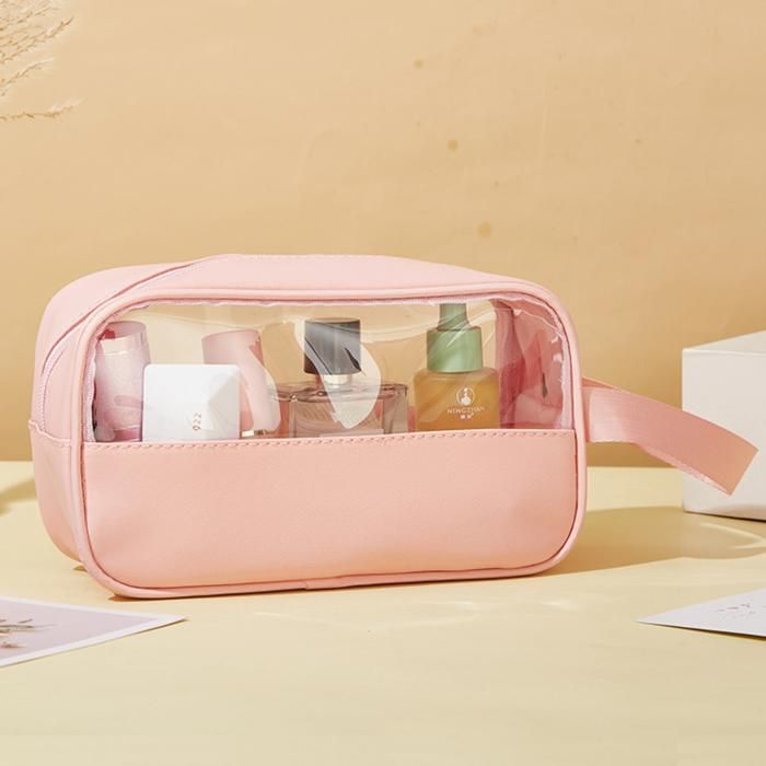 Trousse de toilette étanche fermeture métallique et transparente pour le voyage. Rose