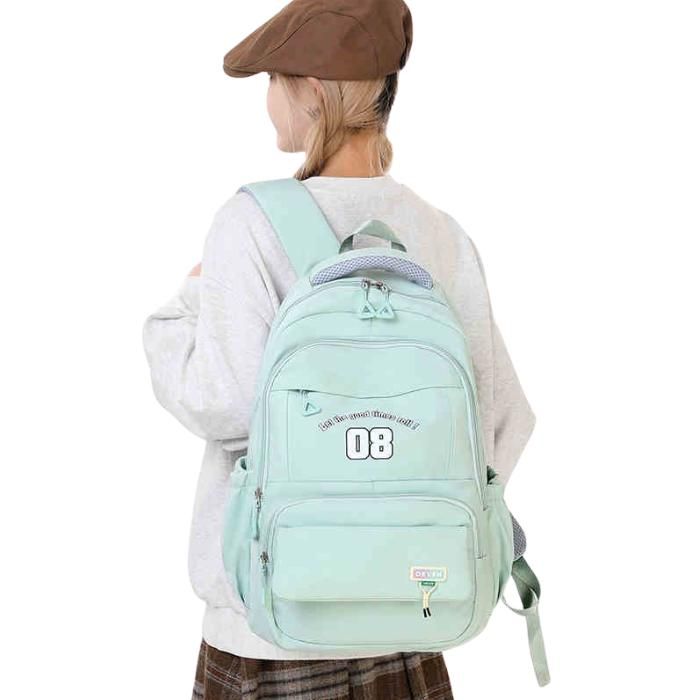 Sac à dos scolaire spacieux avec multiples compartiments et design ergonomique-vert
