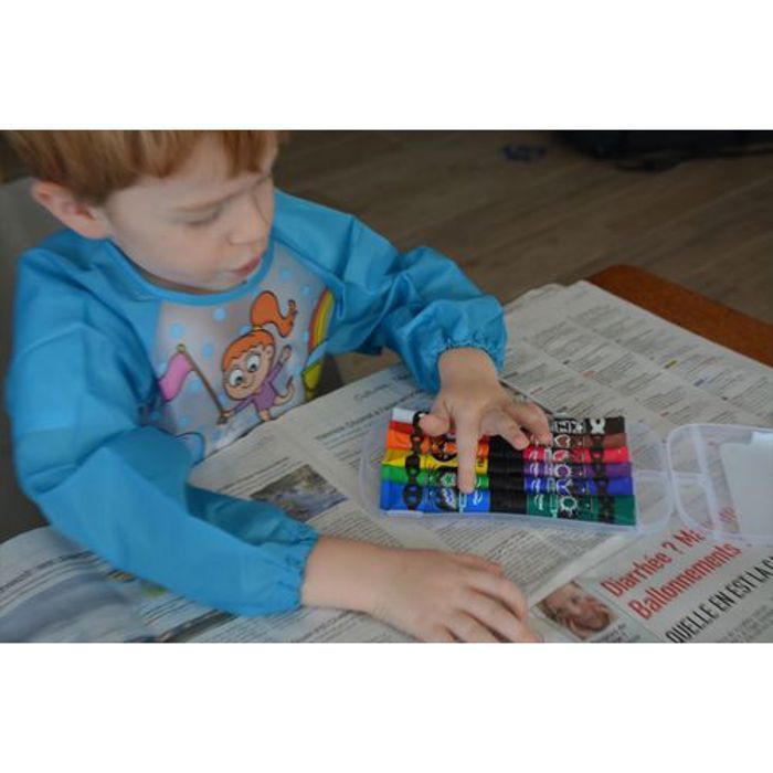 Tablier de peinture imperméable à manches longues.