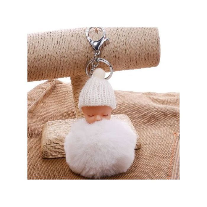 porte clé en forme de bébé avec pompon