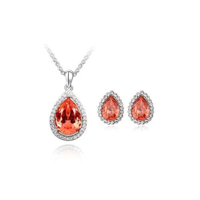 Parure de bijoux , collier et boucles d'oreilles goutte d'eau étincelantes.