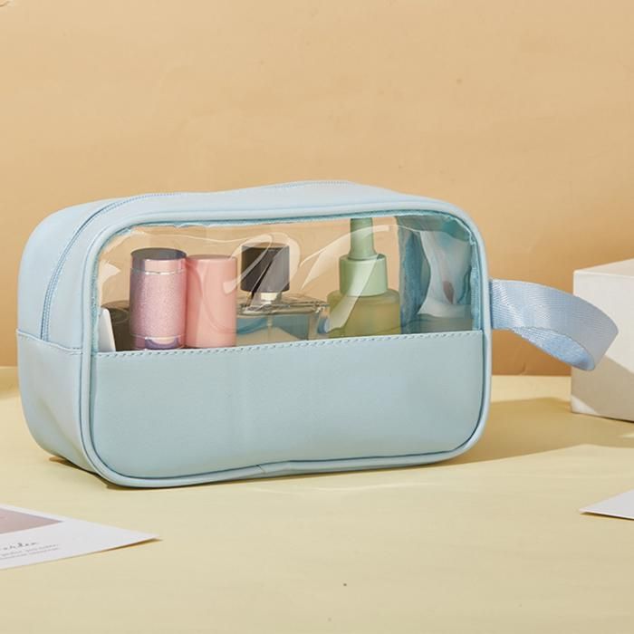 Trousse de toilette étanche fermeture métallique et transparente pour le voyage. Bleu