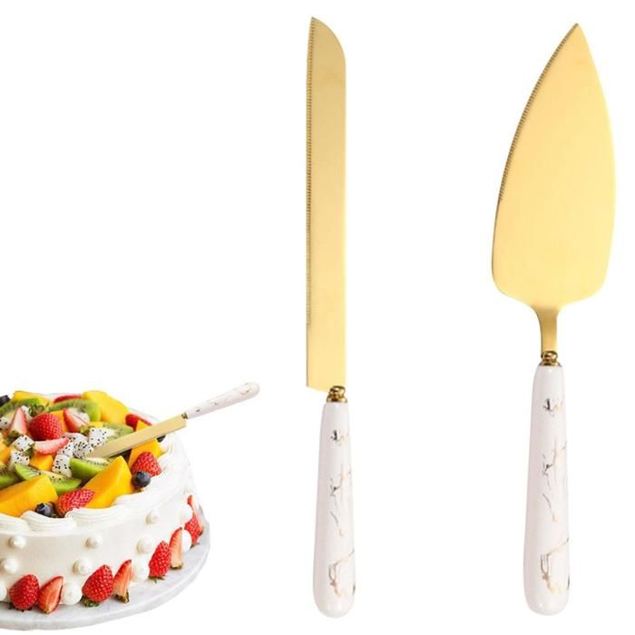 ENSEMBLE 2 PIECES  A GATEAU PELE ET COUTEAU EN INOX ET DETAIL MARBRE  COULEUR BLANCHE