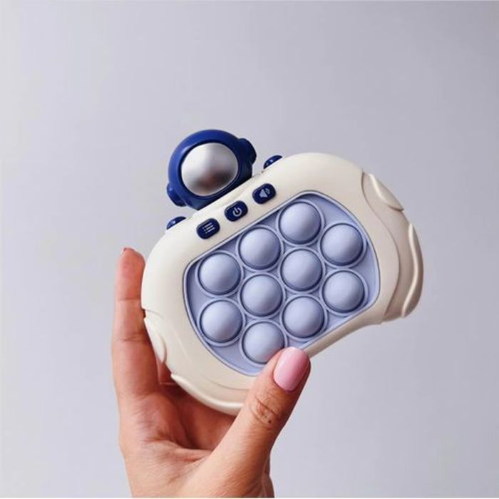 Jeu Pop it Électronique - Pop it - Modèle v2.0 - Astronaute - 4 modes de jeu - Silicone de qualité supérieure