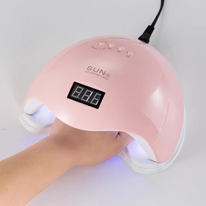 La lampe à ongles en gel Rose + Kit oreillette offert