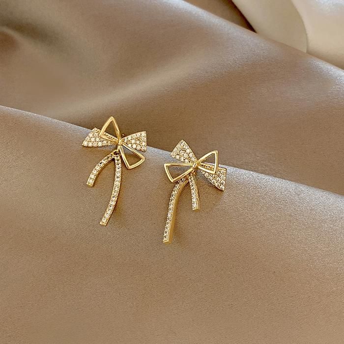 Clémentine Paris Boucles d'oreilles en forme de nœud papillon -OG079